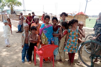 Children from a slum in Bihar, India take a break from class. (Photo by Sarah Garland)