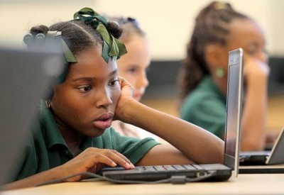 Third grader Keimonni Conner does MAP testing to determine reading and language skills at Lawrence D. Crocker College Prep in New Orleans Friday, Aug. 16, 2013.(Photo by Dinah Rogers, NOLA.com / The Times-Picayune)